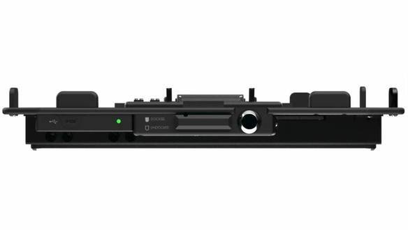 Bottom view of a black docking station with various ports and indicators.