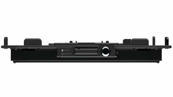 Black docking station for TOUGHBOOK 40 with multiple ports and adjustable side clips.