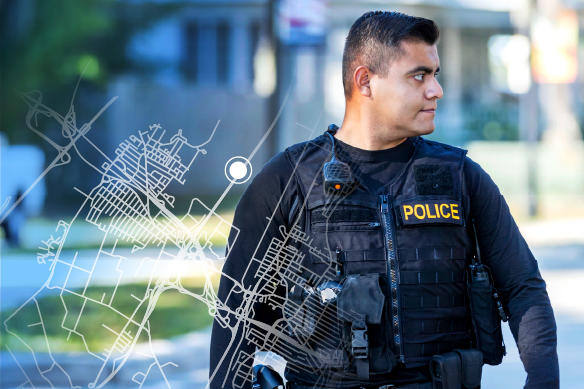 Police Officer in full gear looking towards the right