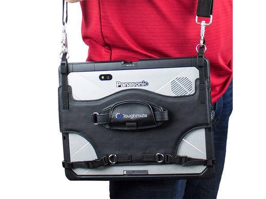 Rotating hand strap on a Panasonic tablet case, worn by a person.