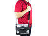Rotating hand strap attached to a tablet case worn over the shoulder.