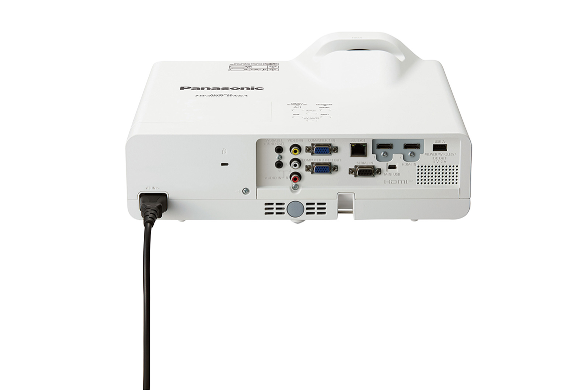 White Panasonic 3LCD interactive short-throw projector with various ports.